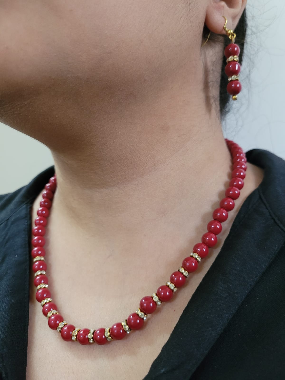 Long red pearl on sale necklace