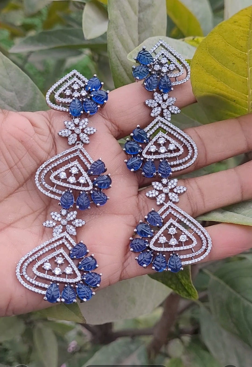 Diamond earrings with blue on sale sapphire